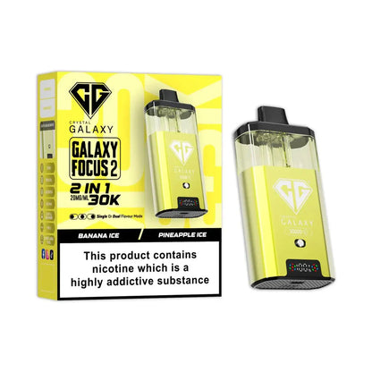 Crystal Galaxy Focus 2 disposable vape pod kit with 30,000 puffs, banana ice and pineapple ice flavors, yellow device and packaging, 20mg nicotine.