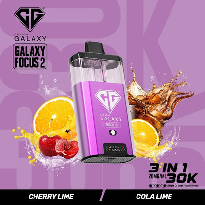 Crystal Galaxy Focus 2 30K prefilled pod vape device in purple with cherry lime and cola lime flavor splash backgrounds, 3-in-1 20mg/ml, 30,000 puffs capacity.